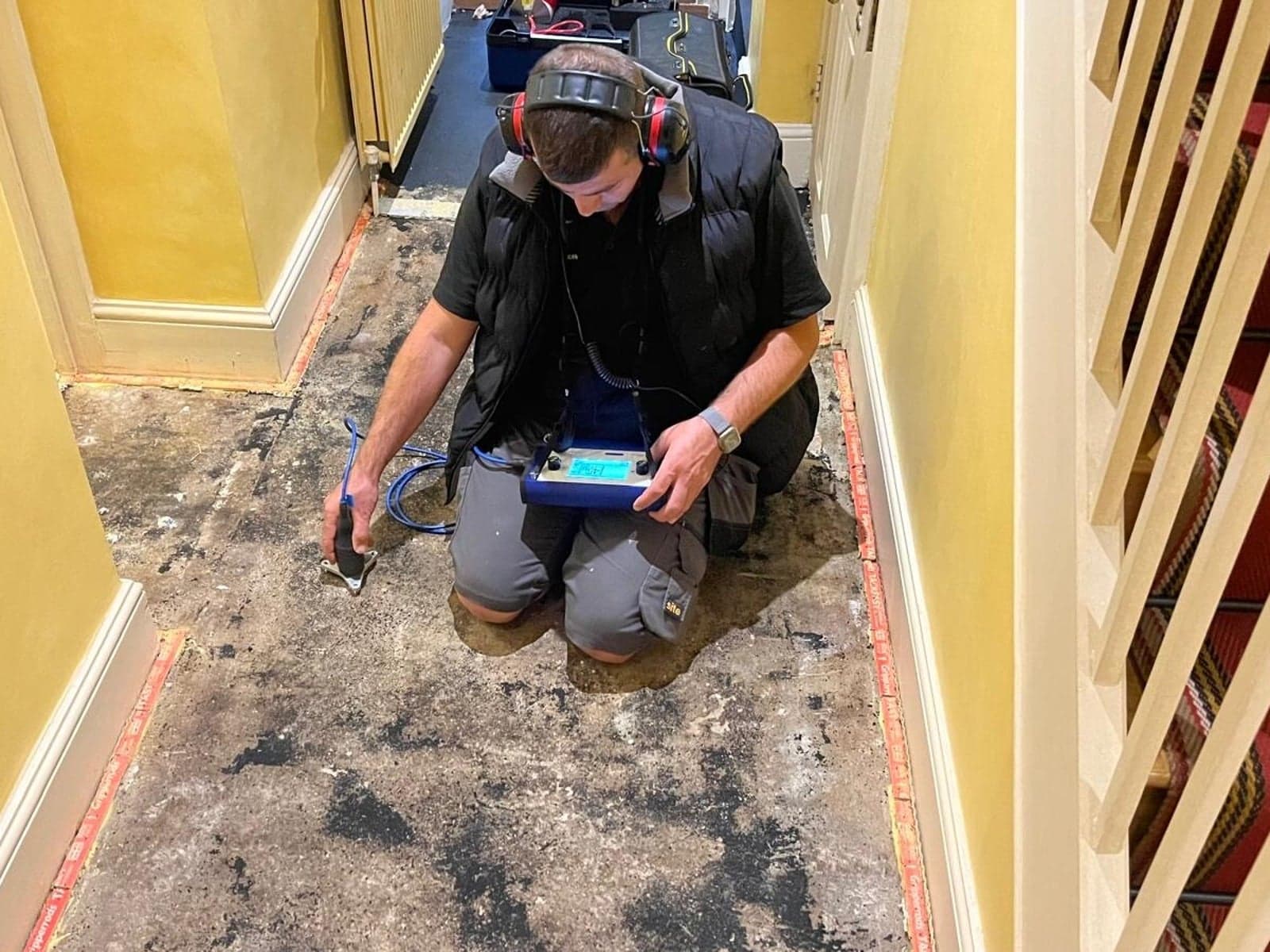 C & C Leak Detection engineer surveying a property